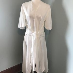 White asymmetrical hem dress with tie at the waist